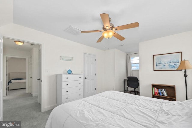 bedroom featuring light carpet, baseboards, and a ceiling fan