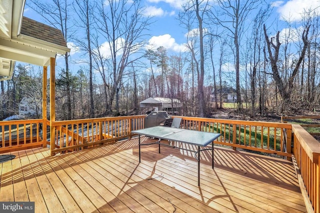 deck with view of wooded area
