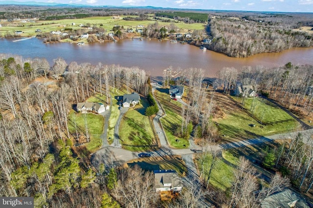 aerial view of property's location with a nearby body of water