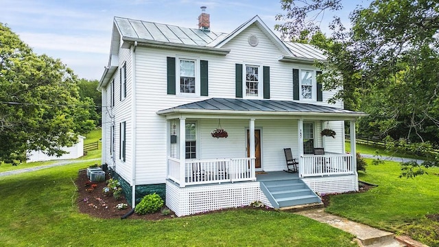 757 Entry School Rd, Waynesboro, VA 22980 - view of front of house featuring a standing seam roof, a metal roof, a porch, and a front yard