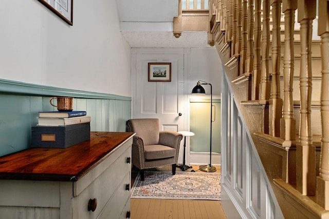 757 Entry School Rd, Waynesboro, VA 22980 - sitting room featuring wood-type flooring, a wainscoted wall, and a decorative wall