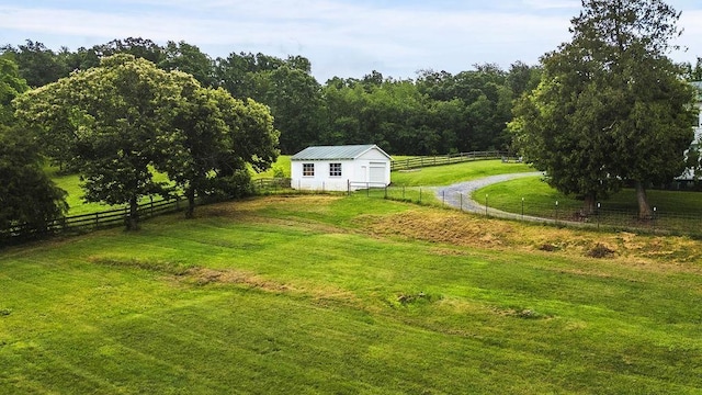 757 Entry School Rd, Waynesboro, VA 22980 - view of yard featuring an outdoor structure, driveway, a rural view, and a wooded view
