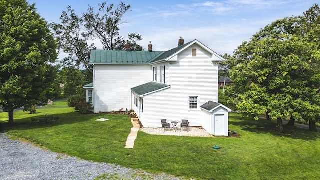 757 Entry School Rd, Waynesboro, VA 22980 - back of house with a chimney, a yard, a metal roof, and a standing seam roof