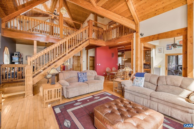 6696 Highlander Way, Crozet, VA 22932 - living room with ceiling fan, hardwood / wood-style floors, stairs, high vaulted ceiling, and wood ceiling with exposed beams