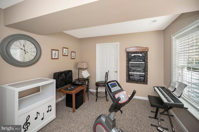 carpeted office with baseboards