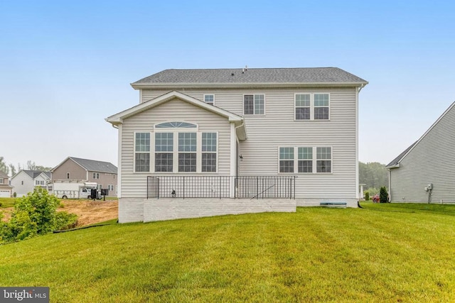 8720 Afton Dr, Spotsylvania, VA 22551 - rear view of property featuring a lawn