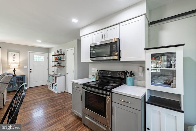 7208 Kirtley Trl, Culpeper, VA 22701 - kitchen featuring stainless steel appliances, gray cabinetry, dark wood-type flooring, light countertops, and white cabinetry