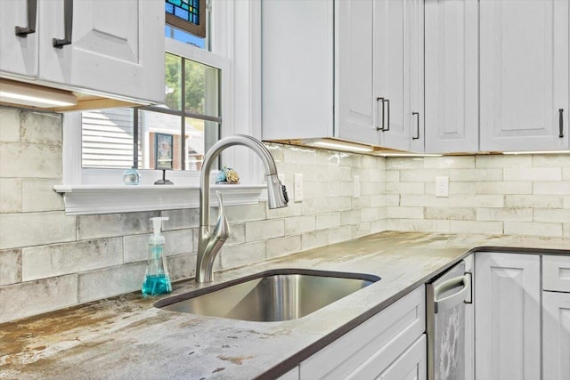 7 Oak View Dr, Staunton, VA 24401 - kitchen featuring white cabinets, light stone counters, tasteful backsplash, and stainless steel dishwasher