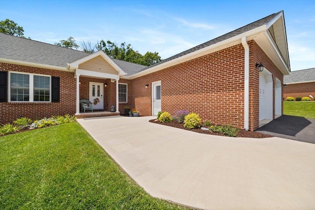 7 Oak View Dr, Staunton, VA 24401 - view of front of property featuring driveway, brick siding, a garage, and a front yard