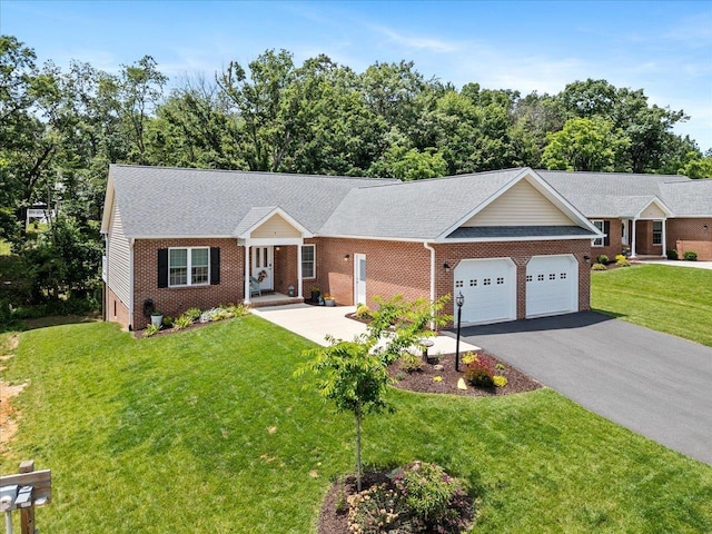 7 Oak View Dr, Staunton, VA 24401 - ranch-style home featuring brick siding, an attached garage, asphalt driveway, and a front lawn