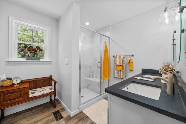 7 Oak View Dr, Staunton, VA 24401 - full bath featuring double vanity, wood finished floors, a marble finish shower, and recessed lighting