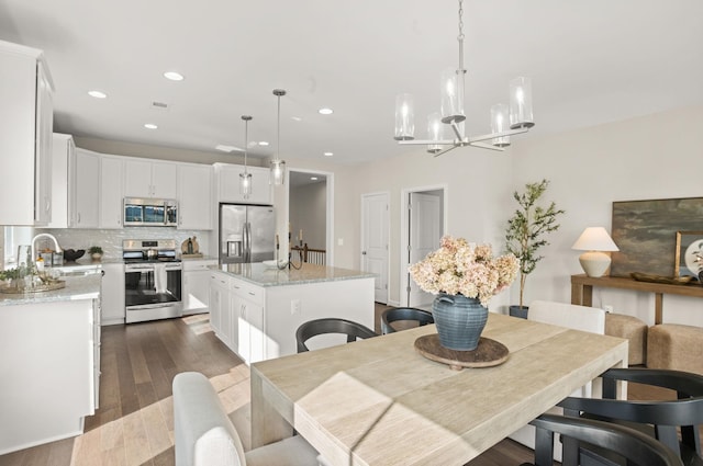 2892 Rutlege Rd Unit 177, Rockingham, VA 22801 - dining area featuring a chandelier, recessed lighting, and dark wood finished floors