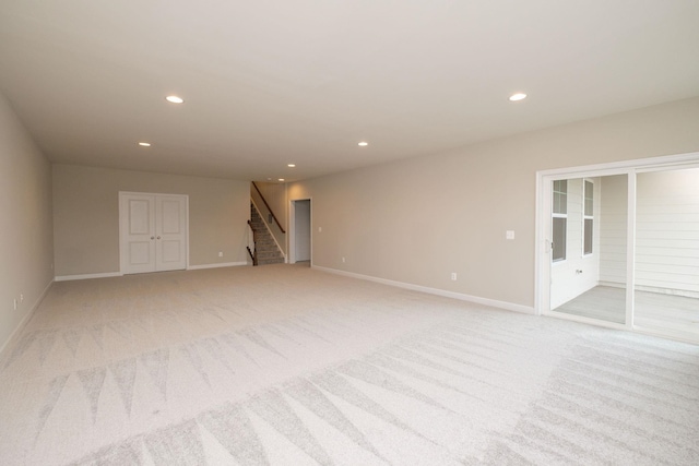 2892 Rutlege Rd Unit 177, Rockingham, VA 22801 - spare room with baseboards, stairway, recessed lighting, and light colored carpet