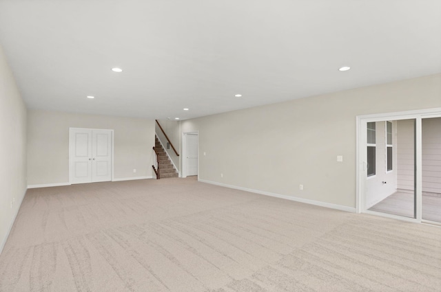 2892 Rutlege Rd Unit 177, Rockingham, VA 22801 - unfurnished living room featuring stairway, light carpet, and recessed lighting