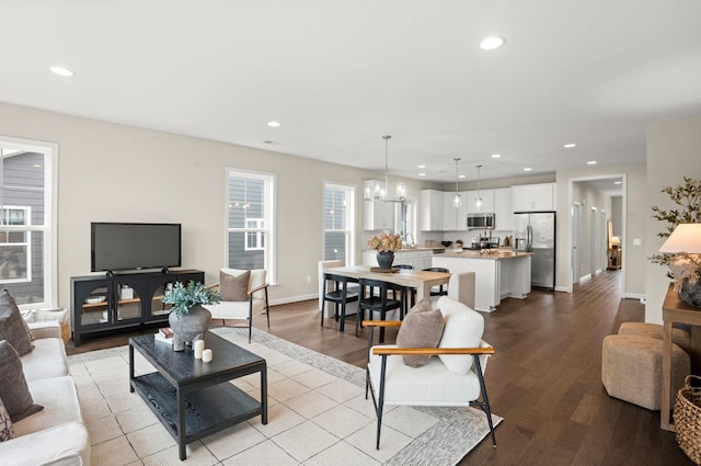 2892 Rutlege Rd Unit 177, Rockingham, VA 22801 - living area with wood finished floors, recessed lighting, and a chandelier