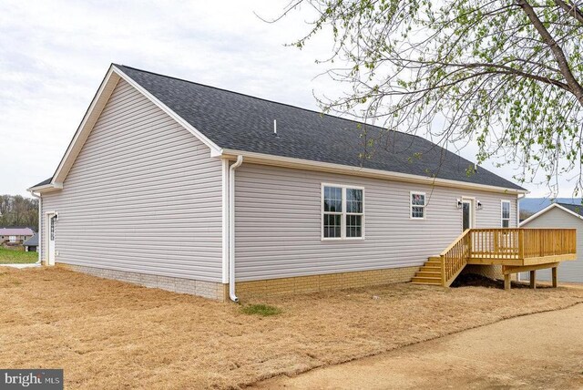 407 Leola Loop, Stanley, VA 22851 - rear view of property featuring a wooden deck and roof with shingles