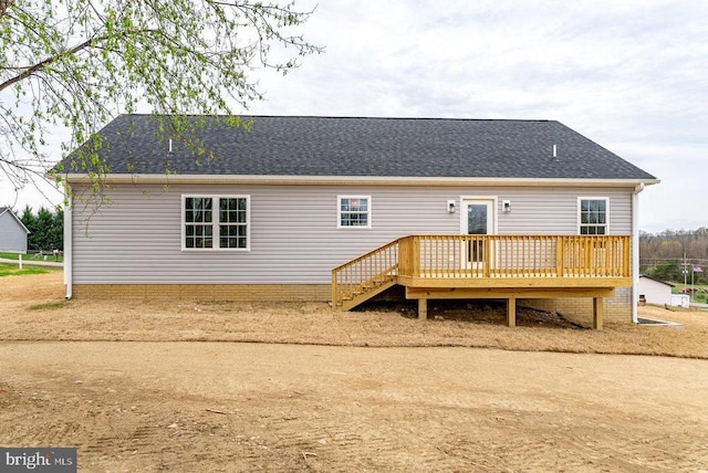 407 Leola Loop, Stanley, VA 22851 - back of property featuring a wooden deck and a shingled roof