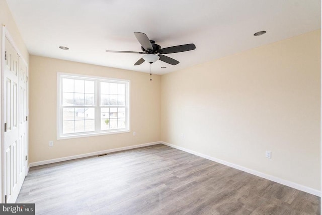 407 Leola Loop, Stanley, VA 22851 - unfurnished room featuring wood finished floors, a ceiling fan, and baseboards