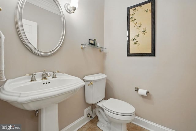 11208 Valor Bridge Dr, Spotsylvania, VA 22551 - half bathroom featuring toilet, baseboards, and tile patterned flooring