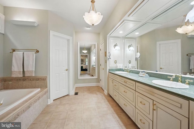 11208 Valor Bridge Dr, Spotsylvania, VA 22551 - ensuite bathroom with tile patterned floors, double vanity, ensuite bathroom, and a sink