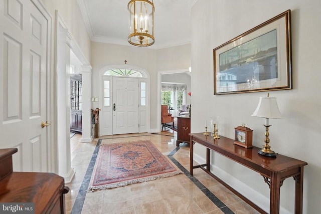11208 Valor Bridge Dr, Spotsylvania, VA 22551 - entryway featuring crown molding, a chandelier, baseboards, and decorative columns