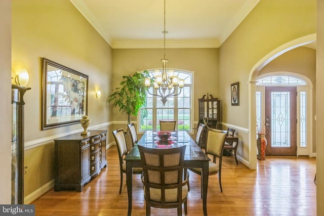 32314 Deep Meadow Ln, Locust Grove, VA 22508 - dining space featuring a chandelier, wood finished floors, ornamental molding, and baseboards