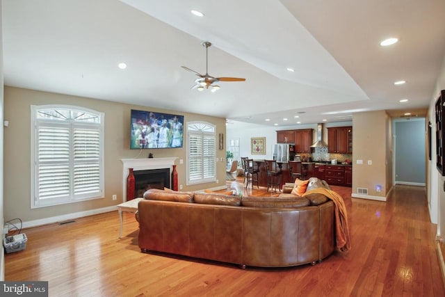 32314 Deep Meadow Ln, Locust Grove, VA 22508 - living room featuring ceiling fan, lofted ceiling, baseboards, light wood-type flooring, and recessed lighting