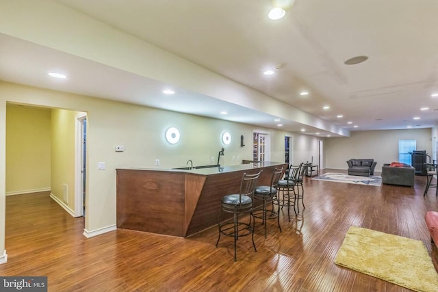 32314 Deep Meadow Ln, Locust Grove, VA 22508 - indoor wet bar featuring wood finished floors, recessed lighting, and baseboards