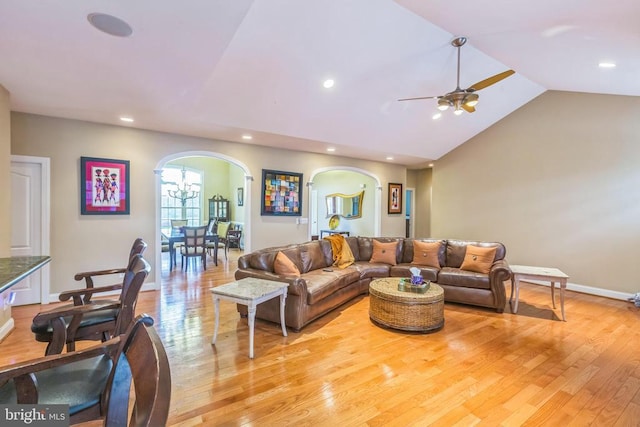 32314 Deep Meadow Ln, Locust Grove, VA 22508 - living area with arched walkways, a ceiling fan, lofted ceiling, light wood finished floors, and recessed lighting