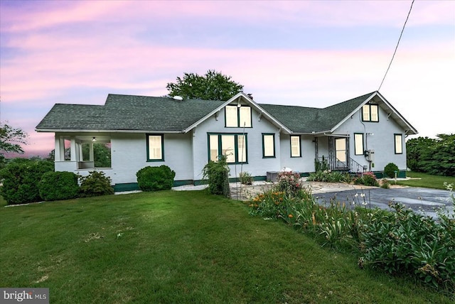 9309 Old Tpke, Culpeper, VA 22701 - view of front facade with a yard, roof with shingles, and stucco siding