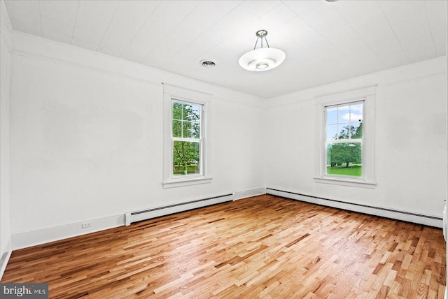 9309 Old Tpke, Culpeper, VA 22701 - unfurnished room with a baseboard radiator and wood finished floors