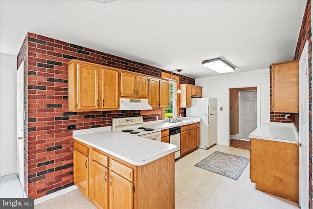 9309 Old Tpke, Culpeper, VA 22701 - kitchen with white appliances, under cabinet range hood, a peninsula, and light countertops