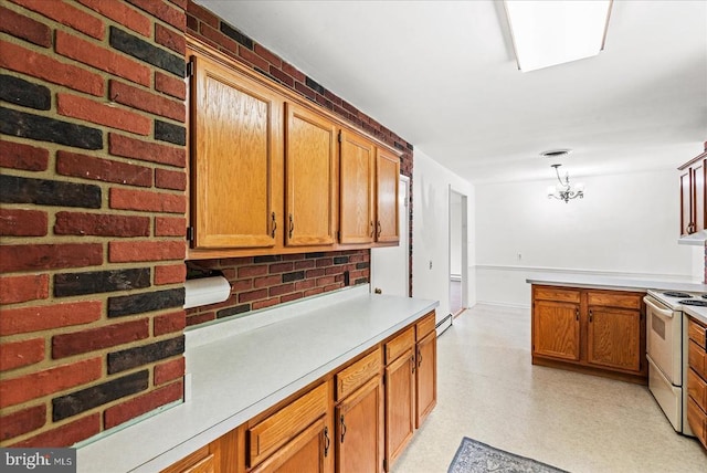 9309 Old Tpke, Culpeper, VA 22701 - kitchen featuring white electric range, light countertops, and brown cabinets