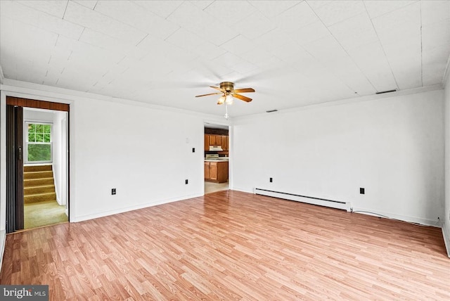 9309 Old Tpke, Culpeper, VA 22701 - unfurnished room with a baseboard radiator, light wood-type flooring, ceiling fan, crown molding, and stairs