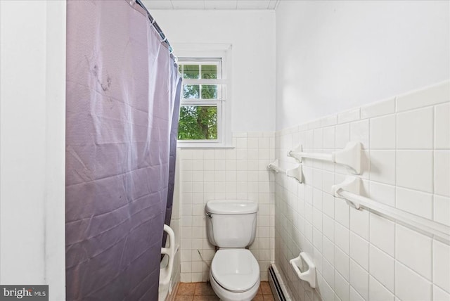 9309 Old Tpke, Culpeper, VA 22701 - full bath featuring tile walls, tile patterned flooring, baseboard heating, wainscoting, and a shower with shower curtain