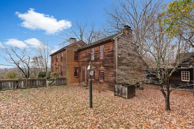 145 Fort Defiance Rd, Fort Defiance, VA 24437 - view of home's exterior with a chimney and fence