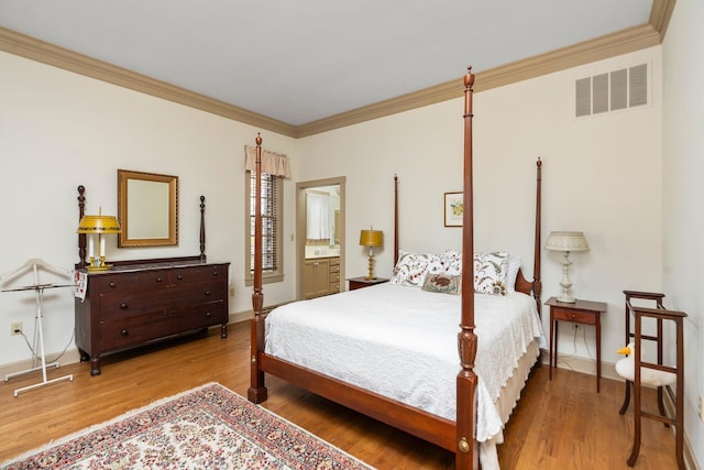 145 Fort Defiance Rd, Fort Defiance, VA 24437 - bedroom featuring wood finished floors, ornamental molding, baseboards, and ensuite bathroom