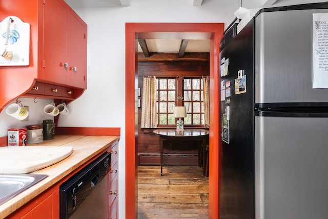 145 Fort Defiance Rd, Fort Defiance, VA 24437 - kitchen featuring freestanding refrigerator, wood-type flooring, dishwasher, beam ceiling, and a sink