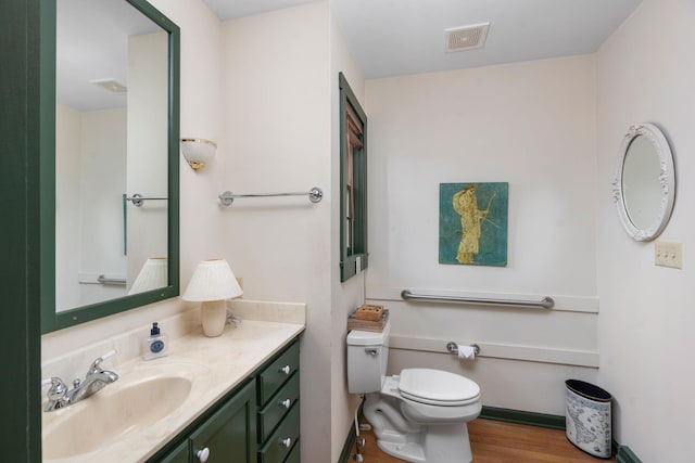 145 Fort Defiance Rd, Fort Defiance, VA 24437 - bathroom featuring toilet, vanity, and wood finished floors