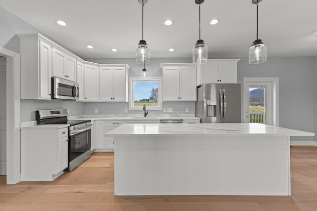 14758 Green View Dr, Elkton, VA 22827 - kitchen featuring stainless steel appliances, a sink, white cabinets, light countertops, and recessed lighting