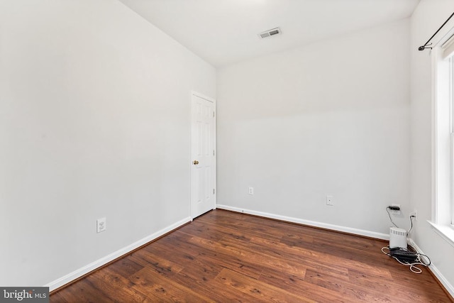 10614 Rhoads Dr, Fredericksburg, VA 22407 - spare room with dark wood-style flooring and baseboards
