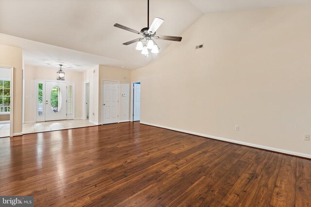 10614 Rhoads Dr, Fredericksburg, VA 22407 - unfurnished living room with wood finished floors, a ceiling fan, baseboards, and high vaulted ceiling
