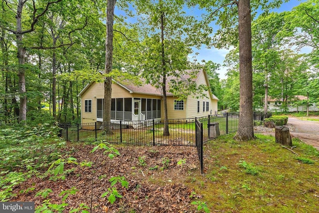 10614 Rhoads Dr, Fredericksburg, VA 22407 - back of house with a sunroom