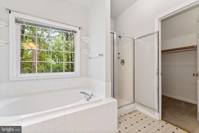 10614 Rhoads Dr, Fredericksburg, VA 22407 - full bath featuring a shower stall, healthy amount of natural light, and a garden tub
