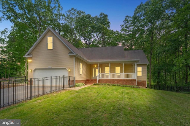 10614 Rhoads Dr, Fredericksburg, VA 22407 - view of front of property with covered porch, an attached garage, and driveway