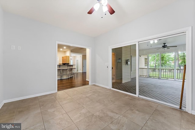 10614 Rhoads Dr, Fredericksburg, VA 22407 - unfurnished room with ceiling fan, baseboards, and tile patterned flooring