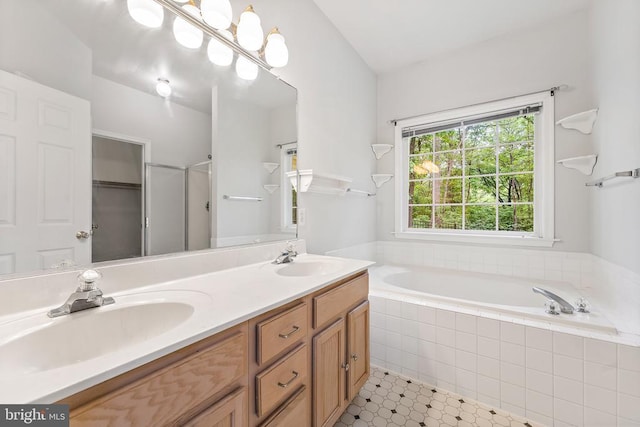 10614 Rhoads Dr, Fredericksburg, VA 22407 - full bath with a garden tub, double vanity, and a stall shower