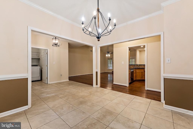 10614 Rhoads Dr, Fredericksburg, VA 22407 - unfurnished dining area with a chandelier, crown molding, tile patterned floors, washer / dryer, and ceiling fan
