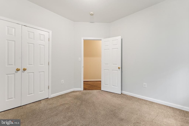 10614 Rhoads Dr, Fredericksburg, VA 22407 - unfurnished bedroom with carpet floors, baseboards, and a closet