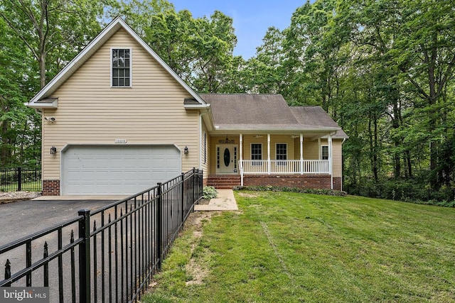 10614 Rhoads Dr, Fredericksburg, VA 22407 - view of front of property with a porch, driveway, and an attached garage